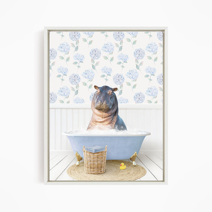 A hippopotamus sitting in a bathtub filled with water, surrounded by a wicker basket and a yellow rubber duck.