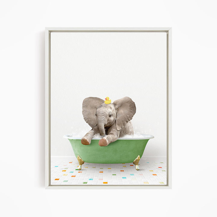 A baby elephant sitting in a green bathtub, with a yellow rubber duck on its head, and a colorful tiled floor in the background.