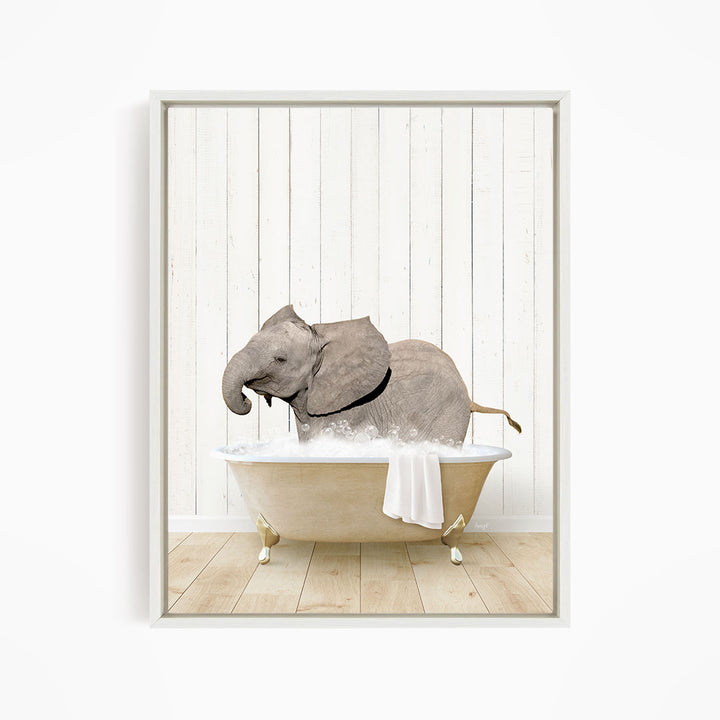 A baby elephant sitting in a bathtub filled with water, surrounded by a white wooden wall.