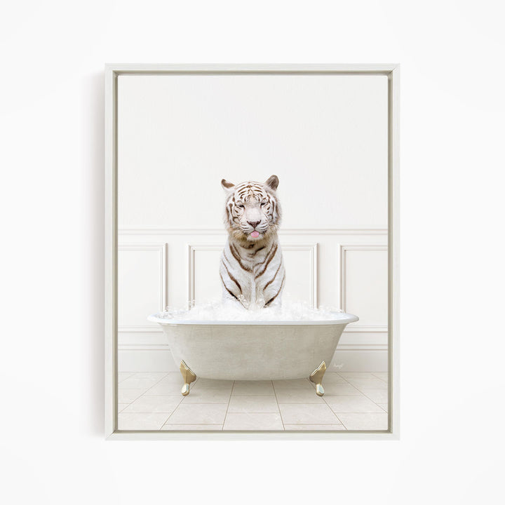 A white tiger sitting in a white bathtub filled with water, with its mouth open and tongue sticking out.