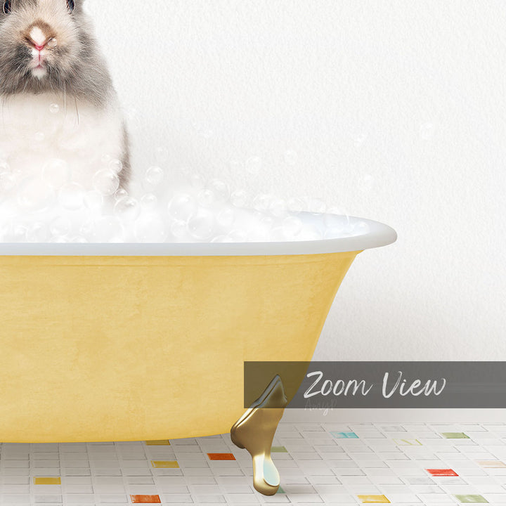 A small, fluffy rabbit sitting in a yellow bathtub filled with bubbles, with a text overlay that reads "Zoom View".