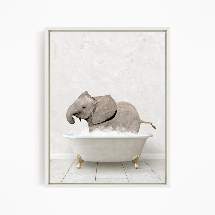 A gray elephant is sitting in a white bathtub filled with water, creating a whimsical and playful scene.