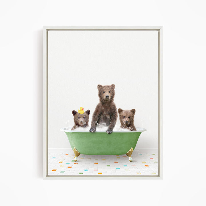 A framed image depicting three bears sitting in a green bathtub filled with water, with one bear sitting in the center and two bears sitting on either side.