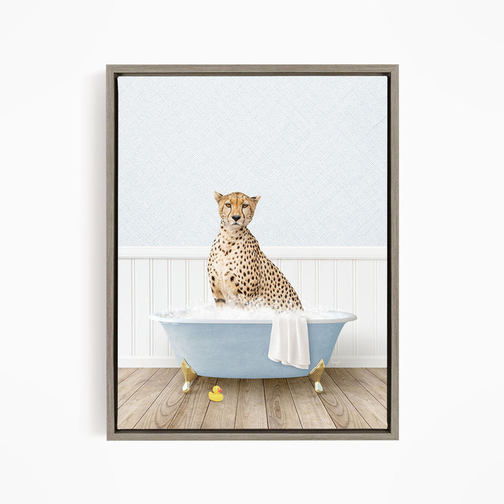 A cheetah sitting in a blue bathtub filled with water, surrounded by rubber ducks.