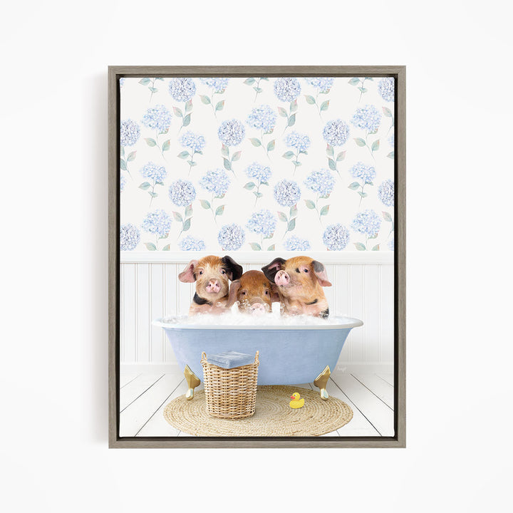 Three adorable pigs sitting in a blue bathtub, surrounded by a wicker basket and yellow rubber ducks.