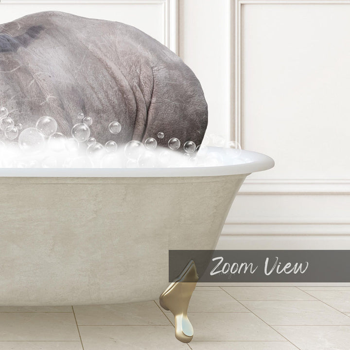 A large gray elephant is sitting in a bathtub filled with bubbles, creating a whimsical and playful scene.