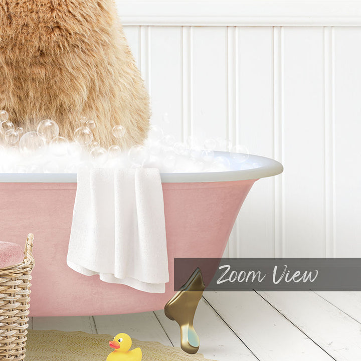 A pink bathtub filled with bubbles, with a fluffy brown dog sitting in it. There is a yellow rubber duck and a white towel nearby.