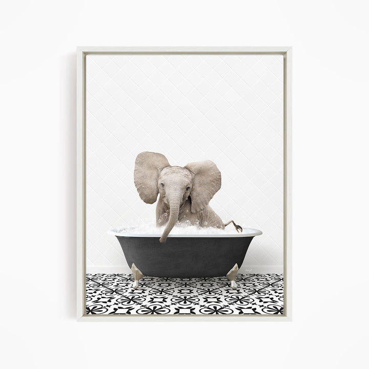 A gray elephant is sitting in a black bathtub filled with water, creating a whimsical and playful scene.