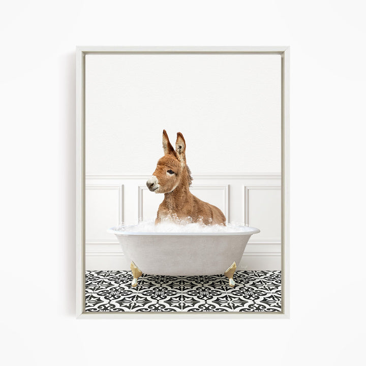 A donkey is sitting in a white bathtub filled with bubbles, creating a whimsical and playful scene.