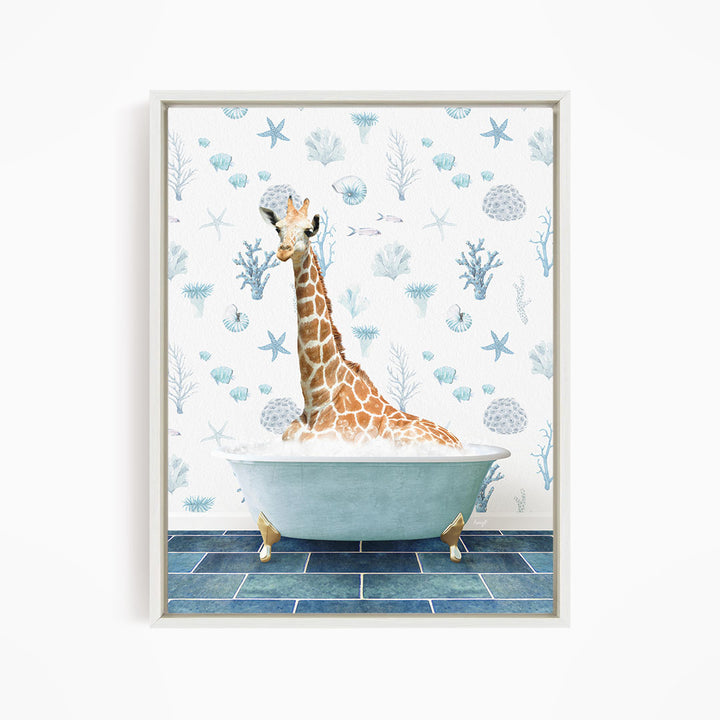 A giraffe is sitting in a bathtub filled with bubbles, surrounded by a blue and white ocean-themed wallpaper.