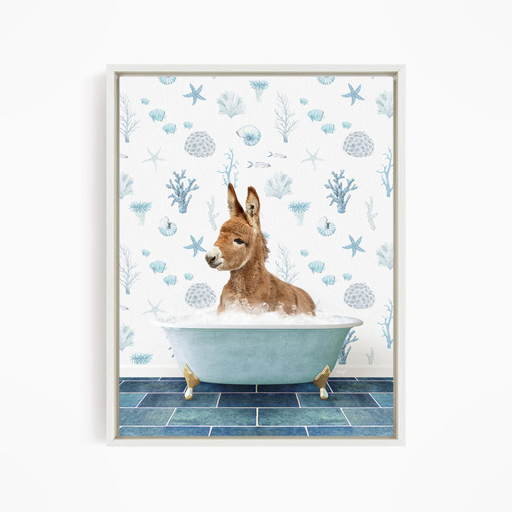 A donkey is sitting in a blue bathtub filled with bubbles, surrounded by a pattern of seashells, starfish, and other marine life.