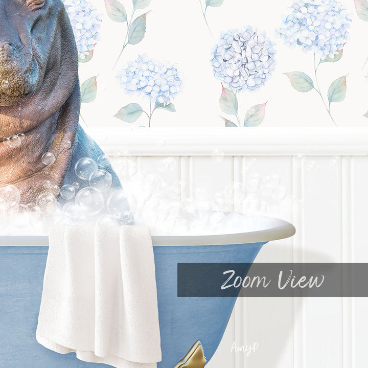 A close-up of a bathtub filled with bubbles, with a large blue bathtub and a towel hanging on it. The background features a floral pattern.