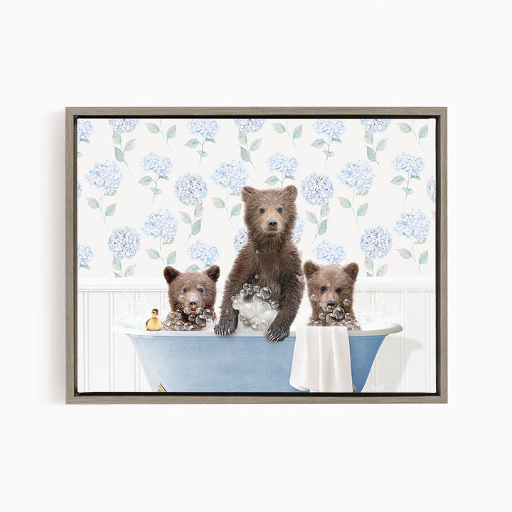 Three adorable brown bears sitting in a blue bathtub, enjoying a relaxing bath surrounded by blue flowers.