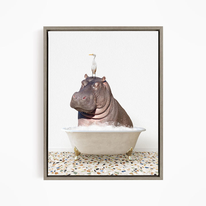 A large hippopotamus is sitting in a bathtub filled with water, with a seagull perched on its head.