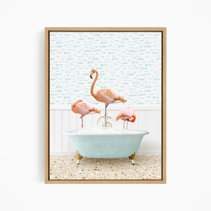 A framed image depicting three flamingos standing in a bathtub filled with water, with a fish-themed wallpaper in the background.