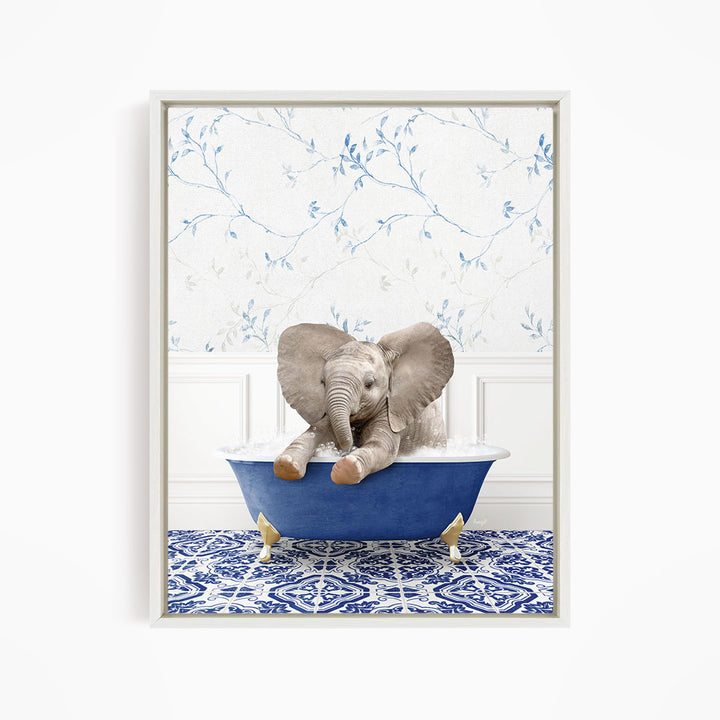 A baby elephant sitting in a blue bathtub, surrounded by a blue and white patterned floor.