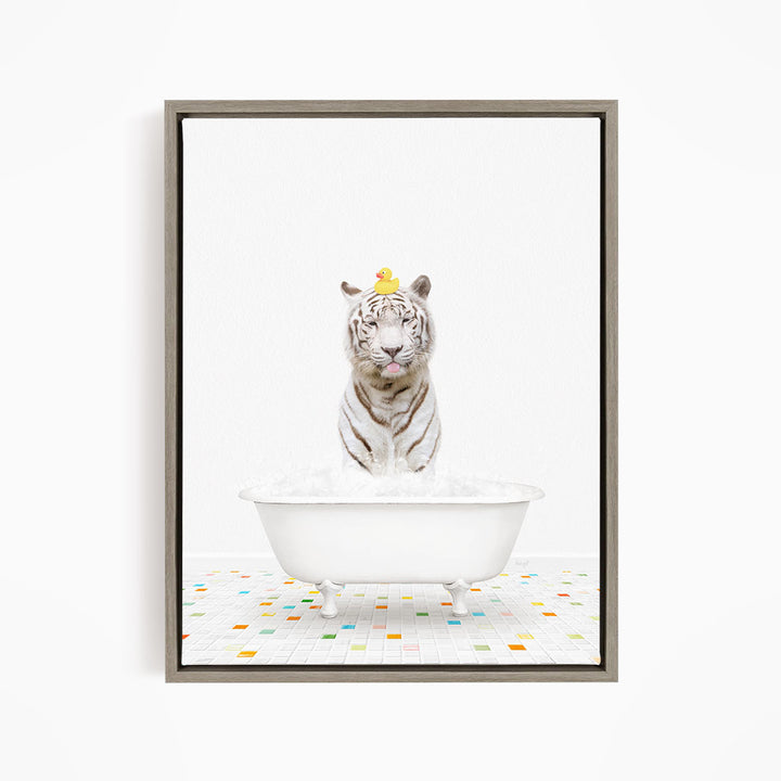 A white tiger is sitting in a white bathtub filled with water, with a yellow rubber duck perched on its head.