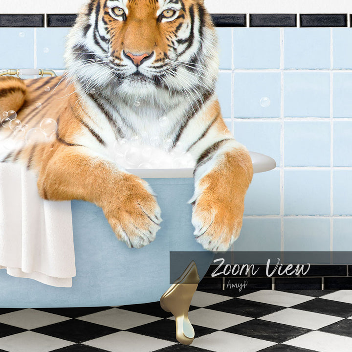 A tiger is sitting in a bathtub filled with water, surrounded by bubbles, in a bathroom with blue and white tiles.