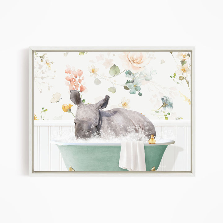 A rhinoceros is sitting in a green bathtub filled with water, surrounded by flowers and greenery.