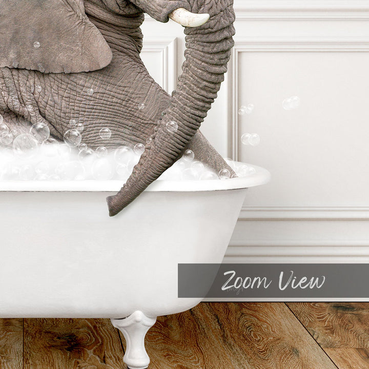 A large gray elephant is sitting in a white bathtub filled with bubbles, creating a whimsical and playful scene.
