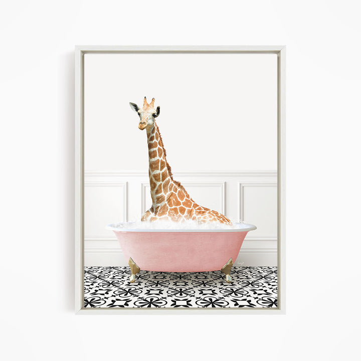 A giraffe sitting in a pink bathtub filled with water, surrounded by a black and white patterned floor.