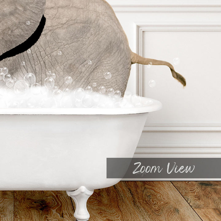 A white bathtub filled with bubbles, with a large elephant's tail submerged in the water.