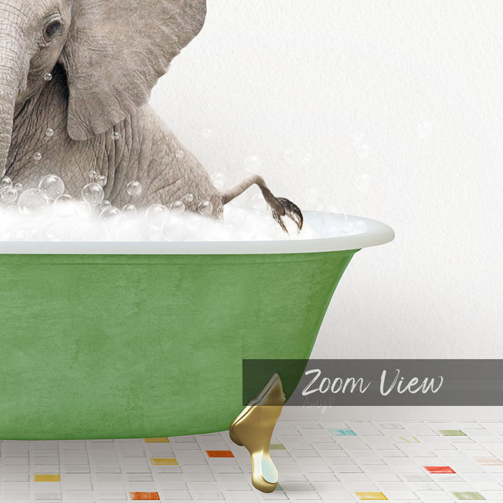 A large elephant is sitting in a green bathtub filled with bubbles, with its foot in the water.
