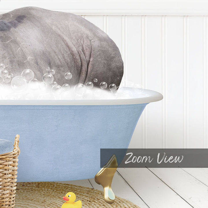 A gray rhinoceros is partially submerged in a blue bathtub filled with bubbles, with a yellow rubber duck nearby.