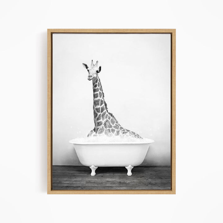 A giraffe sitting in a white bathtub filled with bubbles, creating a whimsical and playful scene.