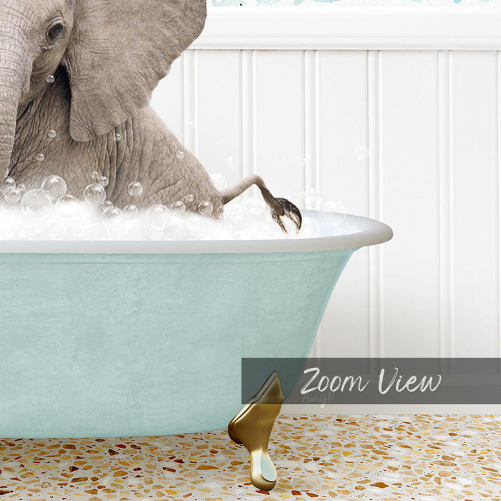 A large elephant is taking a bath in a light blue bathtub, surrounded by bubbles.