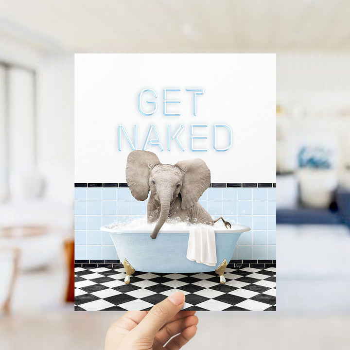 A hand holding a card with an image of an elephant sitting in a bathtub, with the text "GET NAKED" written on it.