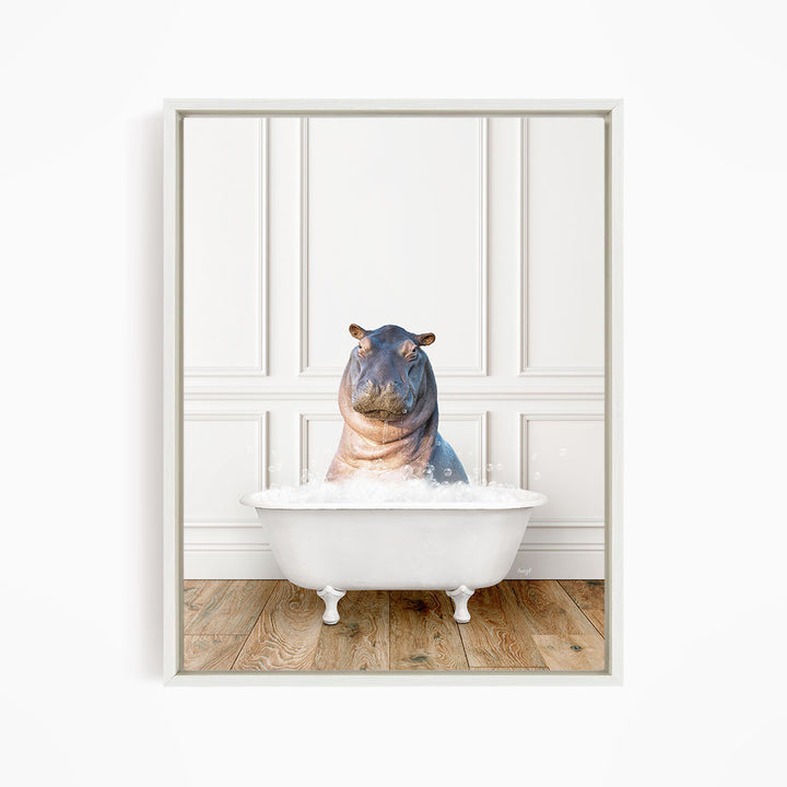 A hippopotamus sitting in a white bathtub filled with water, creating a whimsical and playful scene.