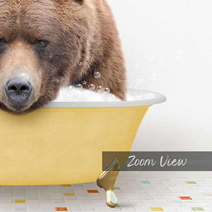 A close-up of a brown bear sitting in a yellow bathtub filled with bubbles, with a text overlay that reads "Zoom View".