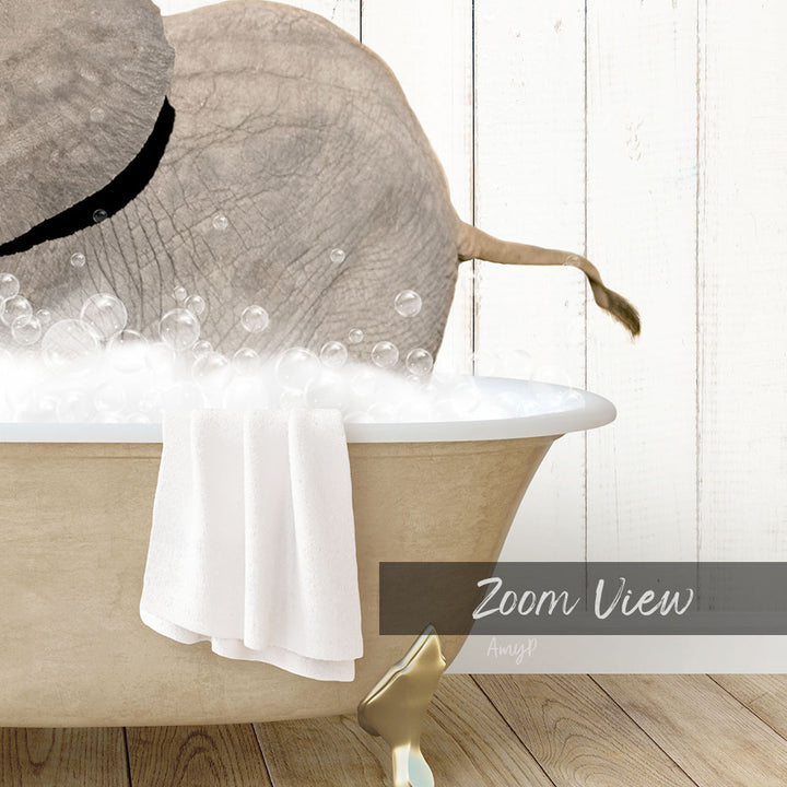 A large elephant is taking a bath in a bathtub filled with bubbles, with a towel draped over the side of the tub.