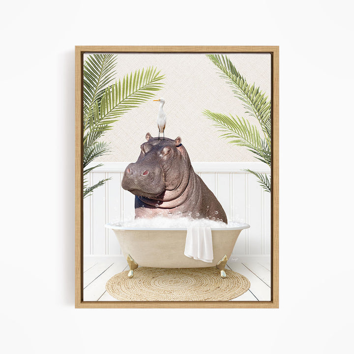 A framed image depicting a hippopotamus sitting in a bathtub, surrounded by palm leaves and a bird.