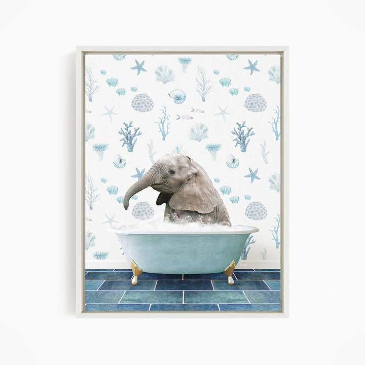 A baby elephant sitting in a bathtub filled with bubbles, surrounded by a blue and white ocean-themed wallpaper.