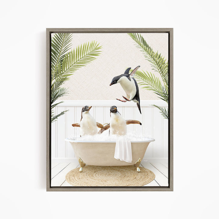 A framed image depicting two penguins sitting in a bathtub, surrounded by palm leaves, with one penguin flying towards the other.