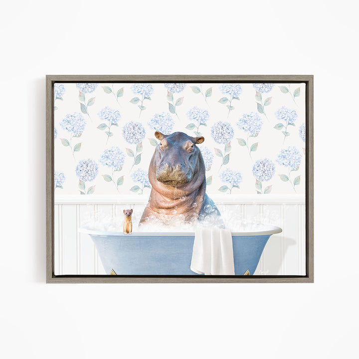 A hippopotamus sitting in a blue bathtub filled with water, surrounded by a floral patterned wall.