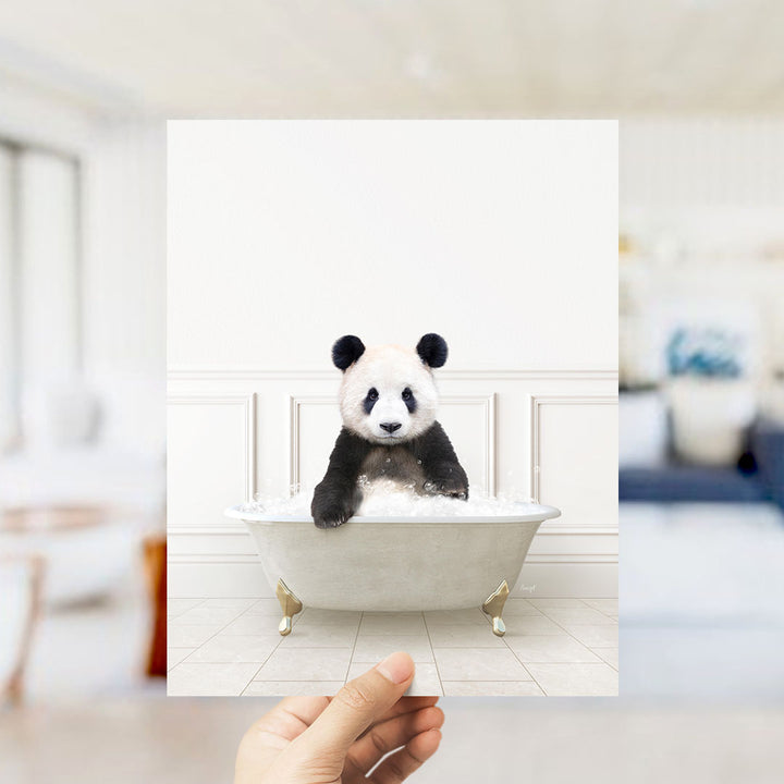 A panda bear sitting in a bathtub filled with bubbles, as if enjoying a relaxing bath.