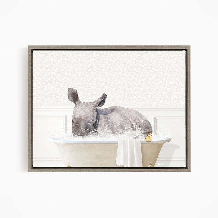 A rhinoceros is sitting in a bathtub filled with water, surrounded by bubbles, creating a whimsical and playful scene.