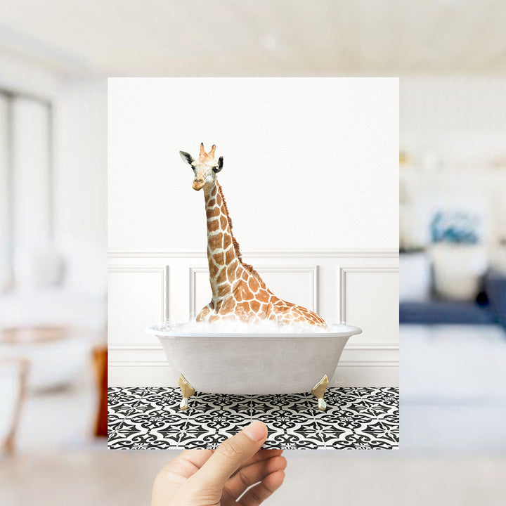 A giraffe sitting in a white bathtub filled with bubbles, creating a whimsical and playful scene.