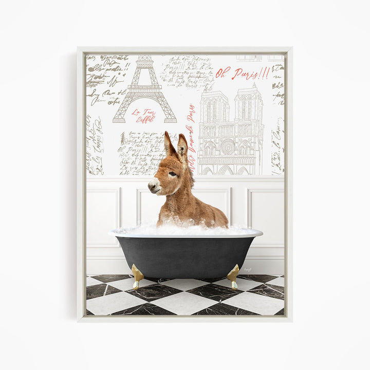 A donkey is sitting in a bathtub filled with water, surrounded by a wall with various inscriptions and illustrations, including the Eiffel Tower.