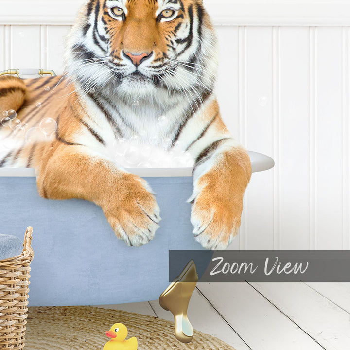 A tiger is sitting in a bathtub filled with water, surrounded by rubber ducks and a basket.