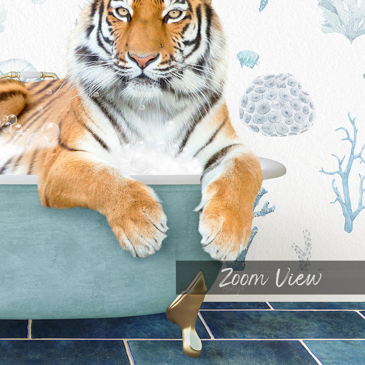 A tiger resting in a bathtub filled with bubbles, surrounded by a blue and white ocean-themed wallpaper.