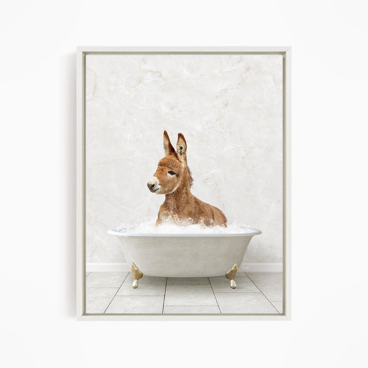 A donkey is sitting in a white bathtub filled with water, creating a whimsical and playful scene.