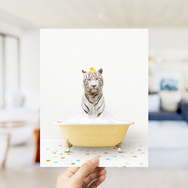 A white tiger sitting in a yellow bathtub, with a rubber duck perched on its head.