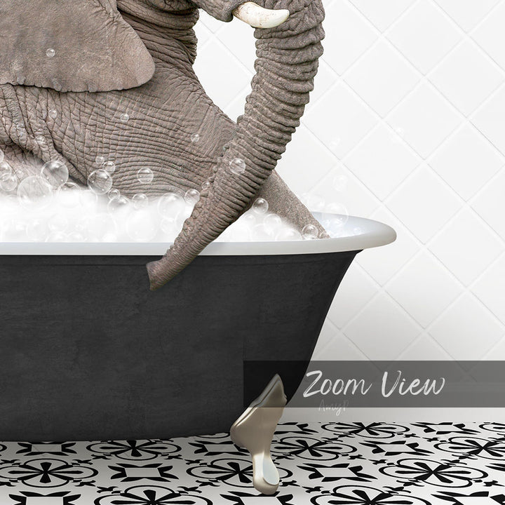 A large gray elephant is sitting in a black bathtub filled with bubbles, with a patterned tile floor in the foreground.