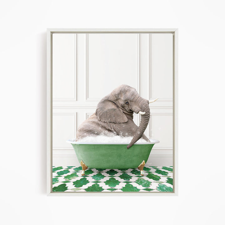 A gray elephant is sitting in a green bathtub filled with water, surrounded by a green and white patterned floor.