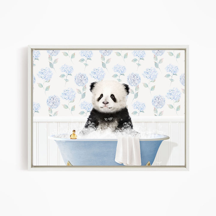 A panda bear sitting in a blue bathtub, surrounded by blue flowers on the wall.
