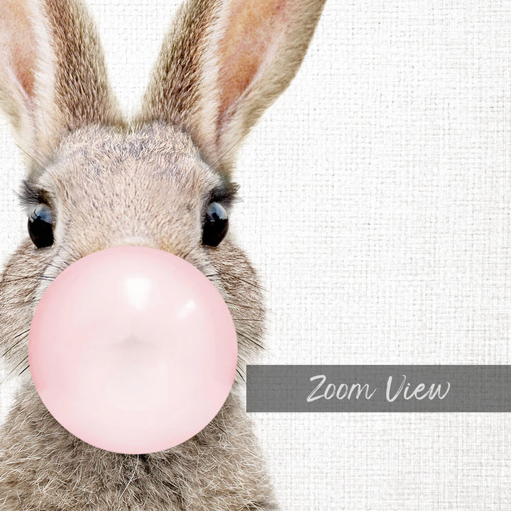A close-up of a rabbit blowing a pink bubble with its nose, with the text "Zoom View" below the image.